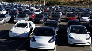 A parking lot of predominantly new Tesla Model 3 electric vehicles is seen in Richmond, California, U.S. June 22, 2018. Picture taken June 22, 2018. REUTERS/Stephen Lam